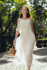 Flowy pleated organza dress with ruffle hem and cold-shoulder strap detail